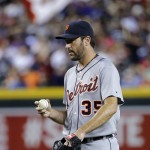 Detroit Tigers pitcher Justin Verlander walks back to the mound after giving up a base hit to Arizona Diamondbacks' Mark Trumbo during the fourth inning of a baseball game, Monday, July 21, 2014, in Phoenix. (AP Photo/Matt York)
