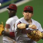  Arizoina Diamondbacks' Cliff Pennington throws out Miami Marlins' Marcell Ozuna at first during the second inning of a baseball game in Miami, Friday, Aug. 15, 2014. (AP Photo/J Pat Carter)