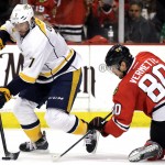 Nashville Predators center Matt Cullen, left, controls the puck against Chicago Blackhawks center Antoine Vermette during the second period in Game 6 of an NHL Western Conference hockey playoff series Saturday, April 25, 2015, in Chicago. (AP Photo/Nam Y. Huh)