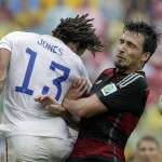 Germany's Mats Hummels, right, and United States' Jermaine Jones go for a header during the group G World Cup soccer match between the USA and Germany at the Arena Pernambuco in Recife, Brazil, Thursday, June 26, 2014. (AP Photo/Matthias Schrader)
