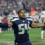 Seattle Seahawks middle linebacker Bobby Wagner (54) celebrates after intercepting a pass during the second half of NFL Super Bowl XLIX football game against the New England Patriots Sunday, Feb. 1, 2015, in Glendale, Ariz. (AP Photo/David J. Phillip)