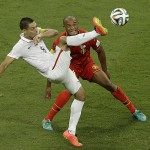 United States' Clint Dempsey, left, and Belgium's Vincent Kompany challenge for the ball during the World Cup round of 16 soccer match between Belgium and the USA at the Arena Fonte Nova in Salvador, Brazil, Tuesday, July 1, 2014. (AP Photo/Themba Hadebe)