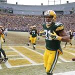 Green Bay Packers tight end Andrew Quarless (81) celebrates a touchdown during the first half of an NFL divisional playoff football game against the Dallas Cowboys Sunday, Jan. 11, 2015, in Green Bay, Wis. (AP Photo/Matt Ludtke)