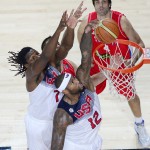 United States' DeMarcus Cousins, right, scores during the final World Basketball match between the United States and Serbia at the Palacio de los Deportes stadium in Madrid, Spain, Sunday, Sept. 14, 2014. (AP Photo/Manu Fernandez)