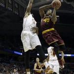  Arizona State guard Shaquielle McKissic (40) goes up for a shot against Texas center Prince Ibeh (44) during the first half of a second round NCAA college basketball tournament game Thursday, March 20, 2014, in Milwaukee. (AP Photo/Morry Gash)