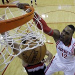 Houston Rockets' Dwight Howard (12) dunks during the first half in Game 2 of an opening-round NBA basketball playoff series against the Portland Trail Blazers Wednesday, April 23, 2014, in Houston. (AP Photo/David J. Phillip)