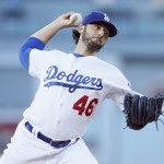 Los Angeles Dodgers starting pitcher Mike Bolsinger delivers against the Arizona Diamondbacks during the first inning of a baseball game Monday, June 8, 2015, in Los Angeles. (AP Photo/Danny Moloshok)