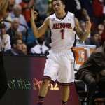 Arizona's Gabe York celebrates a 3-point basket against Oregon during the first half of an NCAA college basketball game in the championship of the Pac-12 conference tournament Saturday, March 14, 2015, in Las Vegas. (AP Photo/John Locher)