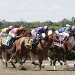  Jockey John Velazquez rides Palace Malice, far right, to victory in the 121st running of the Metropolitan horse race at Belmont Park, Saturday, June 7, 2014, in Elmont, N.Y. The Belmont Stakes will be held at the park later in the day. (AP Photo/Peter Morgan)