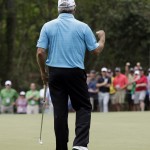  Fred Couples reacts to his par putt on the sixth green during the fourth round of the Masters golf tournament Sunday, April 13, 2014, in Augusta, Ga. (AP Photo/Darron Cummings)