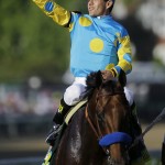 Victor Espinoza reacts after riding American Pharoah to victory in the 141st running of the Kentucky Derby horse race at Churchill Downs Saturday, May 2, 2015, in Louisville, Ky. (AP Photo/Matt Slocum)