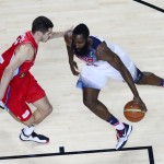 United States' James Harden, right, and Serbia's Nikola Kalinic vie for the ball during the final World Basketball match between the United States and Serbia at the Palacio de los Deportes stadium in Madrid, Spain, Sunday, Sept. 14, 2014. (AP Photo/Manu Fernandez)