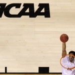 Duke's Jahlil Okafor dunks the ball during the first half of the NCAA Final Four college basketball tournament championship game against Wisconsin Monday, April 6, 2015, in Indianapolis. (AP Photo/Michael Conroy)