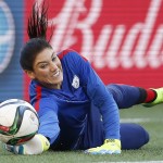 United States goalkeeper Hope Solo warms up prior to a FIFA Women's World Cup soccer match against Sweden in Winnipeg, Manitoba, Canada, Friday, June 12, 2015. (John Woods/The Canadian Press via AP)