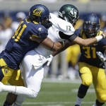 Sacramento State quarterback Garrett Safron (12) is hit by California's Todd Barr, left, causing a fumble during the first half of an NCAA college football game on Saturday, Sept. 6, 2014, in Berkeley, Calif. At right is California's Raymond Davison (31). (AP Photo/Ben Margot)
