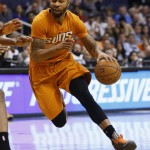 Phoenix Suns' Marcus Morris drives against the Utah Jazz during the second half of an NBA basketball game, Friday, Feb. 6, 2015, in Phoenix. The Suns won 100-93. (AP Photo/Matt York)