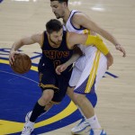 Cleveland Cavaliers guard Matthew Dellavedova (8) is guarded by Golden State Warriors guard Klay Thompson during the first half of Game 2 of basketball's NBA Finals in Oakland, Calif., Sunday, June 7, 2015. (AP Photo/Eric Risberg)