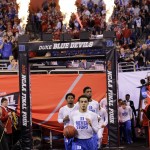Duke players run to the court before the NCAA Final Four college basketball tournament championship game against Wisconsin Monday, April 6, 2015, in Indianapolis. (AP Photo/David J. Phillip)