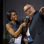 NFL Hall of Famer Dick Butkus, right, talks to Brittney Payton after Butkus announced that the Chicago Bears select Florida State defensive lineman Eddie Goldman as the 39th pick in the second round of the 2015 NFL Football Draft, Friday, May 1, 2015, in Chicago.(AP Photo/Charles Rex Arbogast)