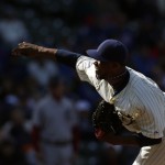 Chicago Cubs relief pitcher Pedro Strop pitches against the Arizona Diamondbacks during the ninth inning of a baseball game at Wrigley Field in Chicago, Wednesday, April 23, 2014. (AP Photo/Andrew A. Nelles)