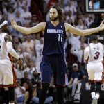 Charlotte Bobcats' Josh McRoberts (11) reacts after being called for a foul during the second half in Game 2 of an opening-round NBA basketball playoff series against the Miami Heat, Wednesday, April 23, 2014, in Miami. The Heat defeated the Bobcats 101-97. (AP Photo/Lynne Sladky)
