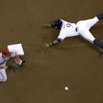 Milwaukee Brewers' Jean Segura (9) steals second with Arizona Diamondbacks shortstop Chris Owings covering during the first inning of a baseball game Monday, May 5, 2014, in Milwaukee. (AP Photo/Morry Gash)