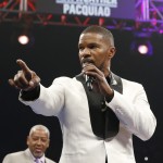 Actor Jamie Foxx sings the national anthem before the start of the world welterweight championship bout between Floyd Mayweather Jr., and Manny Pacquiao, on Saturday, May 2, 2015 in Las Vegas. (AP Photo/Isaac Brekken)