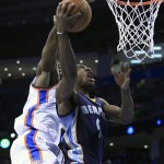  Memphis Grizzlies guard Tony Allen, front, goes to the basket in front of Oklahoma City Thunder forward Serge Ibaka during the first quarter of Game 1 of the opening-round NBA basketball playoff series in Oklahoma City on Saturday, April 19, 2014. (AP Photo/Alonzo Adams)