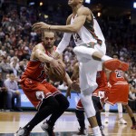 Chicago Bulls' Joakim Noah strips the ball from Milwaukee Bucks' Giannis Antetokounmpo during the second overtime of Game 3 of an NBA basketball first-round playoff series Thursday, April 23, 2015, in Milwaukee. The Bulls won 113-106 to take a 3-0 lead in the series. (AP Photo/Morry Gash)