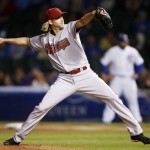  Arizona Diamondbacks starting pitcher Bronson Arroyo delivers against the Chicago Cubs during the first inning of a baseball game on Monday, April 21, 2014, in Chicago. (AP Photo/Andrew A. Nelles)