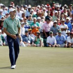  Jordan Spieth reacts as his ball misses the cup on the ninth hole for a birdie during the fourth round of the Masters golf tournament Sunday, April 13, 2014, in Augusta, Ga. (AP Photo/Matt Slocum)