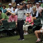 Hunter Mahan reacts to his chip shot to the sixth green during the fourth round of the Masters golf tournament Sunday, April 12, 2015, in Augusta, Ga. (AP Photo/Matt Slocum)