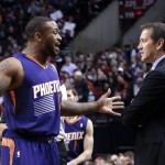  Phoenix Suns forward P.J. Tucker, left, talks with coach Jeff Hornacek during the first half of an NBA basketball game against the Portland Trail Blazers in Portland, Ore., Friday, April 4, 2014. (AP Photo/Don Ryan)