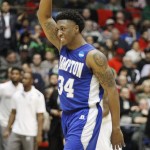 Hampton's Reginald Johnson celebrates after a 74-64 win over Manhattan in a first round NCAA tournament basketball game Tuesday, March 17, 2015 in Dayton, Ohio. Hampton advances to face top-ranked Kentucky. (AP Photo/Skip Peterson)