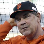 San Francisco Giants manager Bruce Bochy watches during baseball practice Monday, Oct. 20, 2014, in Kansas City, Mo. The Kansas City Royals will host the Giants in Game 1 of the World Series on Oct. 21. (AP Photo/David J. Phillip)