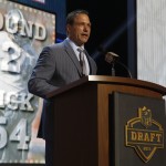 Former Detroit Lions player Chris Spielman announces that the Detroit Lions selects Nebraska running back Ameer Abdullah-as the 54th pick in the second round of the 2015 NFL Football Draft, Friday, May 1, 2015, in Chicago. (AP Photo/Charles Rex Arbogast)