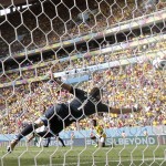 Colombia's goalkeeper David Ospina fails to make a save as Ivory Coast's Gervinho scores his side's first goal during the group C World Cup soccer match between Colombia and Ivory Coast at the Estadio Nacional in Brasilia, Brazil, Thursday, June 19, 2014. (AP Photo/Marcio Jose Sanchez)