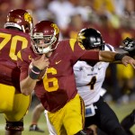 Southern California quarterback Cody Kessler (6) takes the ball in for a touchdown during the second half of an NCAA college football game against Arizona State, Saturday, Oct. 4, 2014, in Los Angeles. Arizona State won 38-34. (AP Photo/Gus Ruelas)