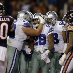 Dallas Cowboys running back DeMarco Murray (29) celebrates a touchdown with his teammates during the first half of an NFL football game against the Chicago Bears Thursday, Dec. 4, 2014, in Chicago. (AP Photo/Nam Y. Huh)