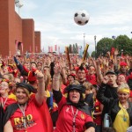Fans of the Belgian national soccer team cheer while watching their quarterfinals soccer match against Argentina, broadcast on a video screen in front of the King Baudouin stadium in Brussels, Saturday, July 5, 2014. (AP Photo/Yves Logghe)