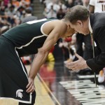 Michigan State head coach Tom Izzo talks to Travis Trice, left, during the second half of a regional final in the NCAA men's college basketball tournament Sunday, March 29, 2015, in Syracuse, N.Y. (AP Photo/Heather Ainsworth)