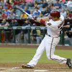  Arizona Diamondbacks' Miguel Montero connects for an RBI single against the Milwaukee Brewers during the first inning of a baseball game on Tuesday, June 17, 2014, in Phoenix. (AP Photo/Ross D. Franklin)
