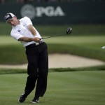 Jim Furyk hits his tee shot on the fifth hole during the third round of the PGA Championship golf tournament at Valhalla Golf Club on Saturday, Aug. 9, 2014, in Louisville, Ky. (AP Photo/David J. Phillip)
