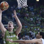Dominican Republic's Eloy Vargas, right, vies for the ball against Slovenia's Zoran Dragic, left, during Basketball World Cup Round of 16 match between Dominican Republic and Slovenia at the Palau Sant Jordi in Barcelona, Spain, Saturday, Sept. 6, 2014. The 2014 Basketball World Cup competition will take place in various cities in Spain from Aug. 30 through to Sept. 14. (AP Photo/Manu Fernandez)