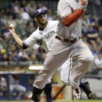  Milwaukee Brewers starting pitcher Marco Estrada makes a play on a bunt by Arizona Diamondbacks' Ender Inciarte during the fifth inning of a baseball game Tuesday, May 6, 2014, in Milwaukee. (AP Photo/Morry Gash)