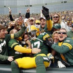 Green Bay Packers' Davante Adams celebrates his touchdown catch with fans during the second half of an NFL football game against the Carolina Panthers Sunday, Oct. 19, 2014, in Green Bay, Wis. (AP Photo/Mike Roemer)