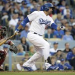  Los Angeles Dodgers' Adrian Gonzalez, right, hits a two-RBI single during the fifth inning of a baseball game against the Arizona Diamondbacks, Saturday, April 19, 2014, in Los Angeles. (AP Photo/Jae C. Hong)