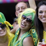 Supporters react before the start of the second half of the group H World Cup soccer match between Belgium and Algeria at the Mineirao Stadium in Belo Horizonte, Brazil, Tuesday, June 17, 2014. (AP Photo/Hassan Ammar)