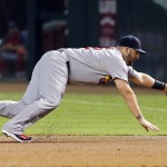 St. Louis Cardinals' Matt Adams dives, but can't catch the ball hit by Arizona Diamondbacks' Ender Inciarte during the first inning of a baseball game Saturday, Sept. 27, 2014, in Phoenix. (AP Photo/Ross D. Franklin)
