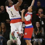 Kevin Hart shoots over Mo'ne Davis during the first half of the NBA All-Star celebrity basketball game Friday, Feb. 13, 2015, in New York. (AP Photo/Frank Franklin II)